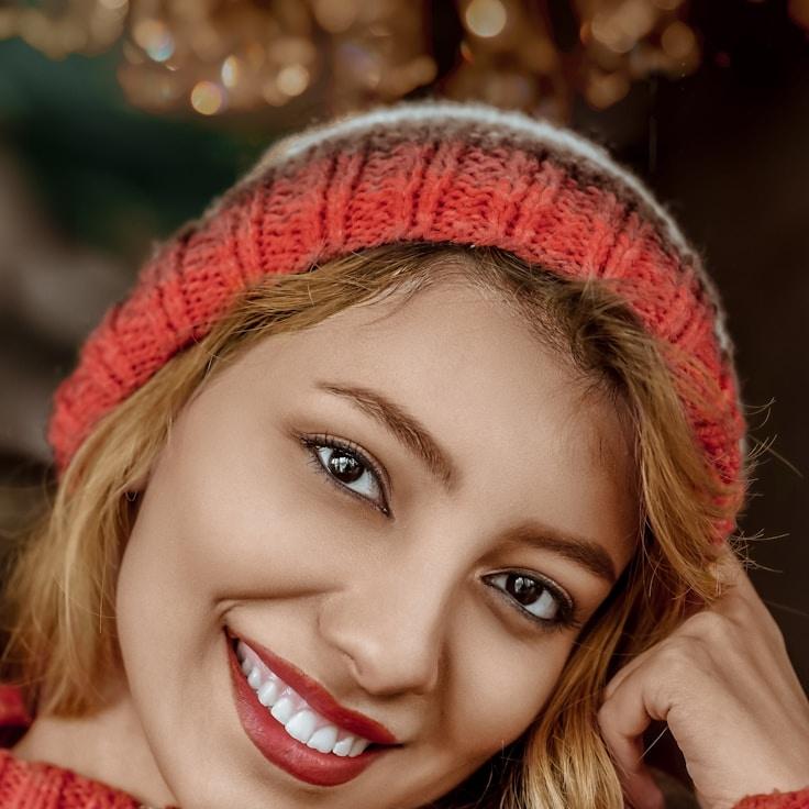 Avery Lin, Lead Design Curator at MarblePebbleField, reviewing corporate floral arrangements